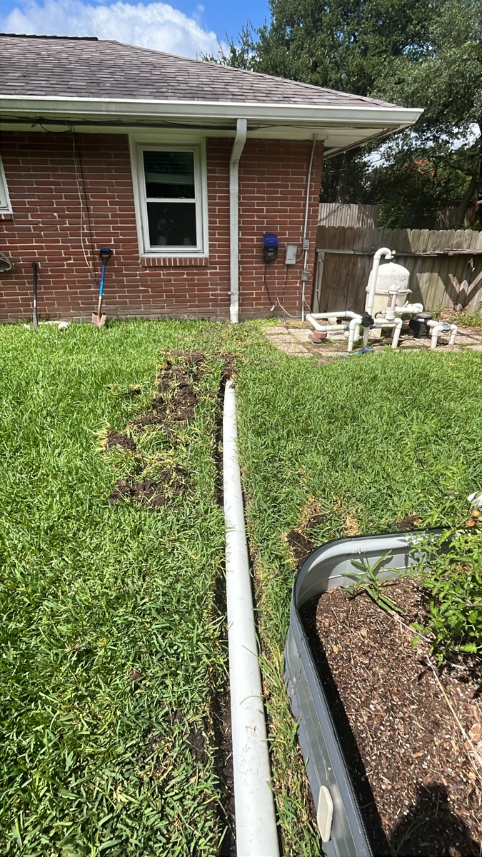 Downspout drain extension installed at a Cypress, TX home