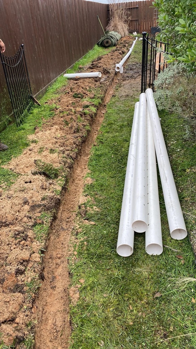 French drain installation in a Memorial, Houston TX residential yard